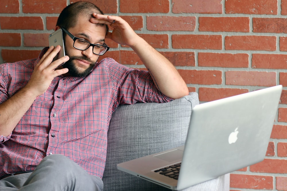 a man with a laptop