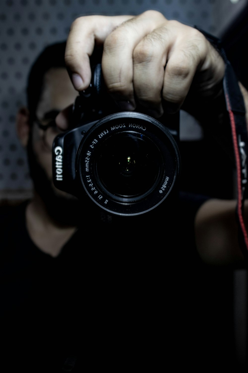 a person holding a camera