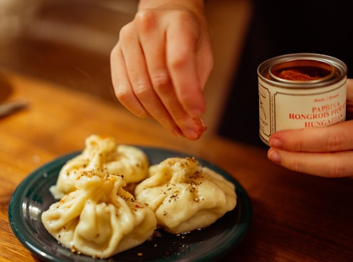 a plate of food and a can of sauce