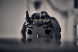 Close-up of a detailed character model showcasing intricate armor and facial expressions in a Morlonix title.