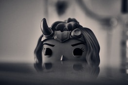 Close-up of a vintage RPG character portrait with a scroll border.