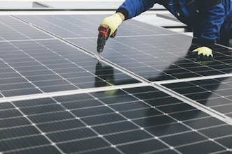 A technician monitoring solar energy systems.