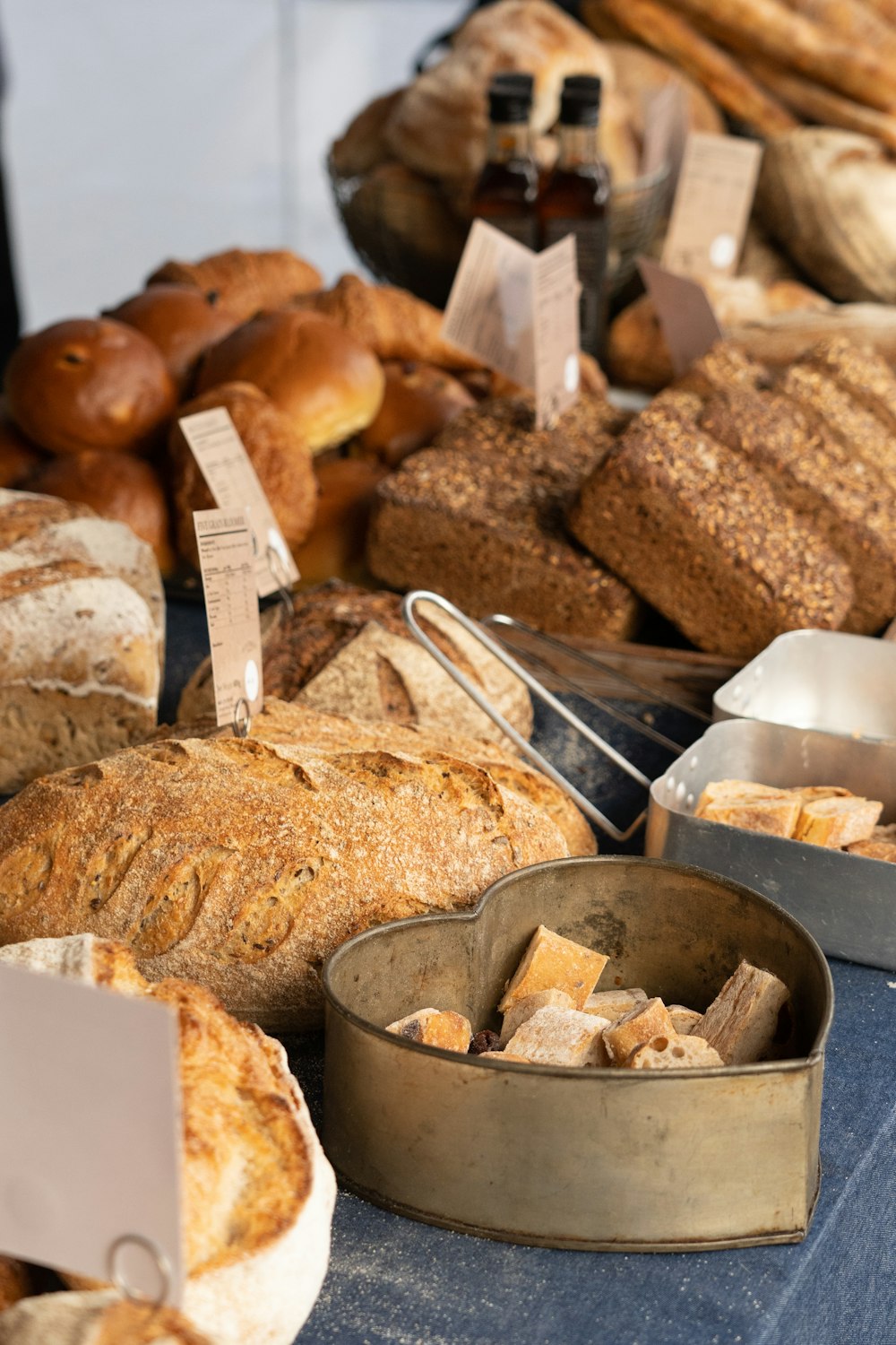 a group of pastries in a display case