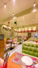 A cozy dining area with modern decor and happy customers.