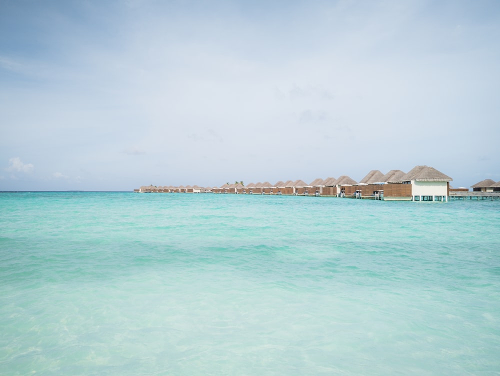 a group of buildings on a beach