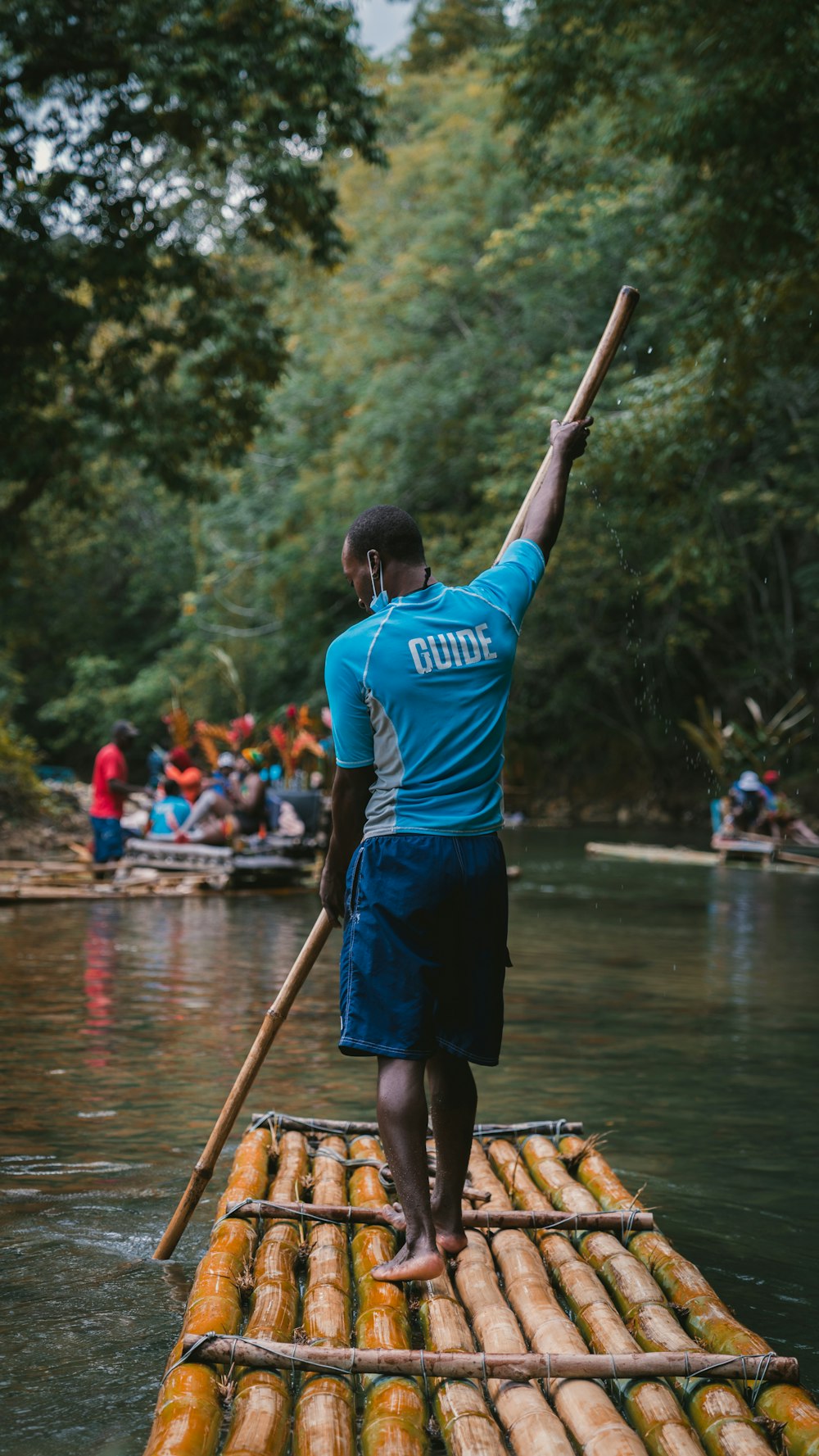 a person on a boat holding a paddle