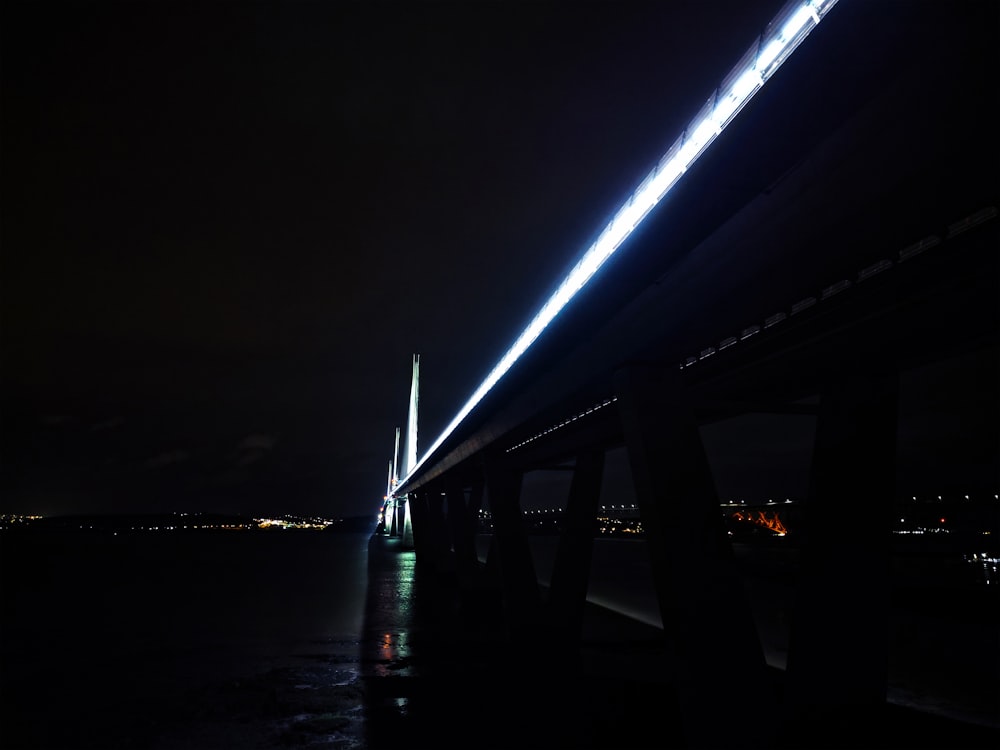 a bridge with lights at night