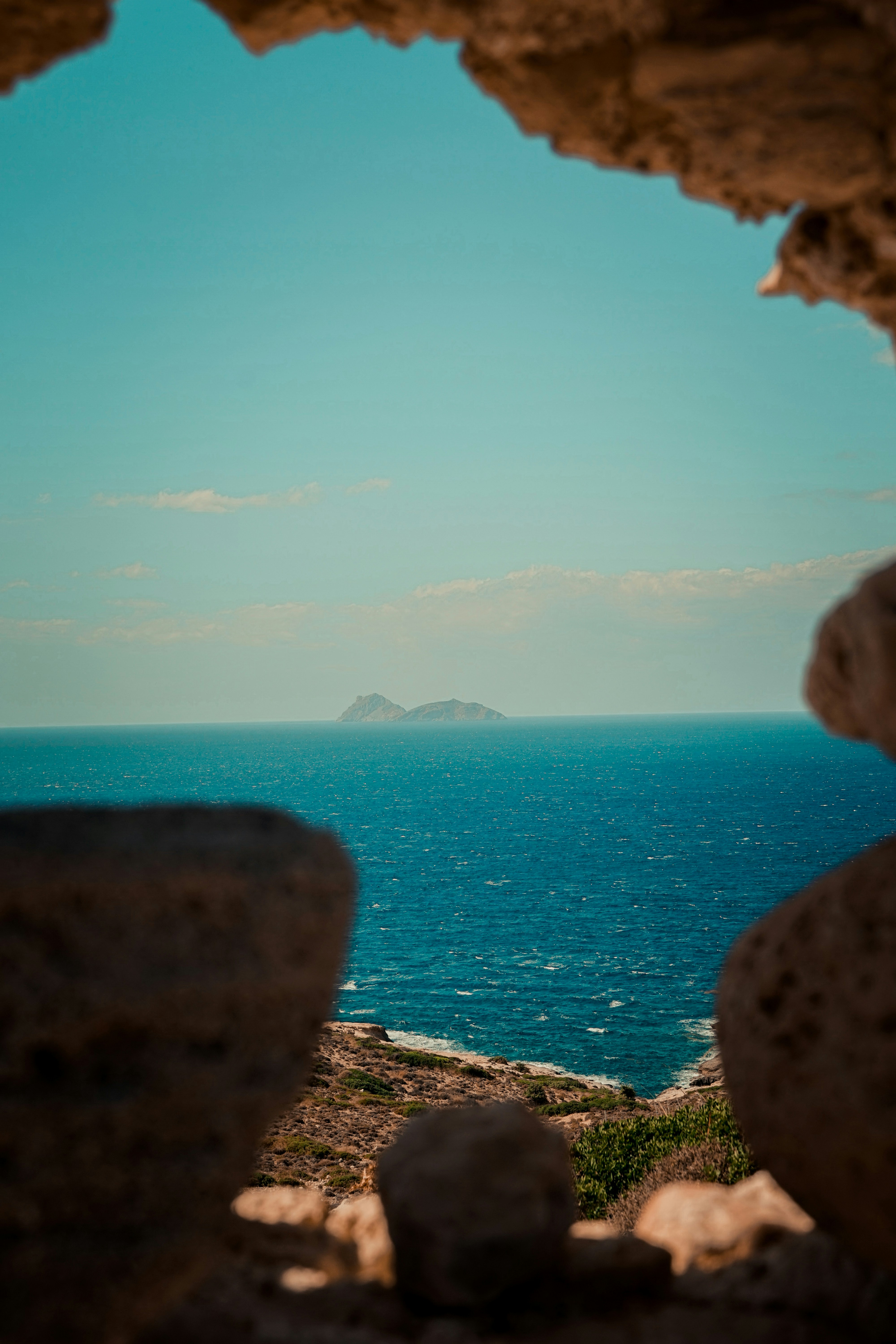 a view of the ocean from a cliff