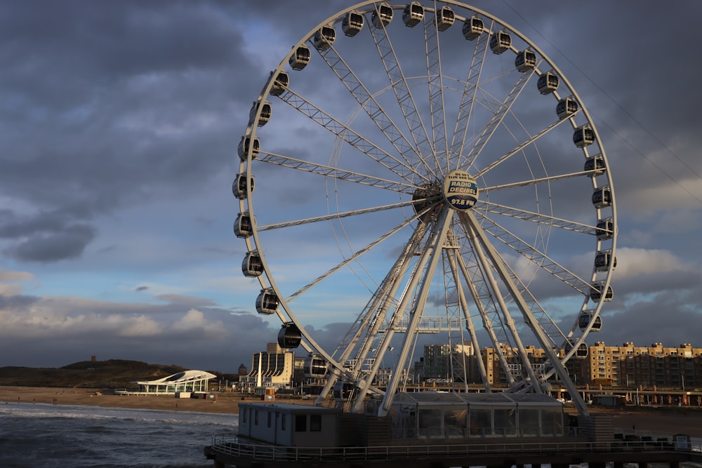 a ferris wheel by the water