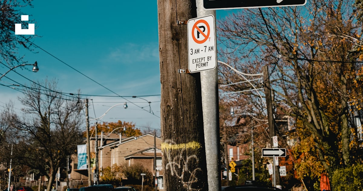 A Street Sign On A Pole Photo Free Toronto Image On Unsplash a-street-sign-on-a-pole-photo-free-toronto-image-on-unsplash