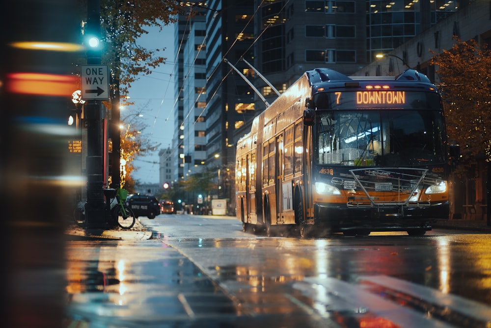 a bus travels down the street