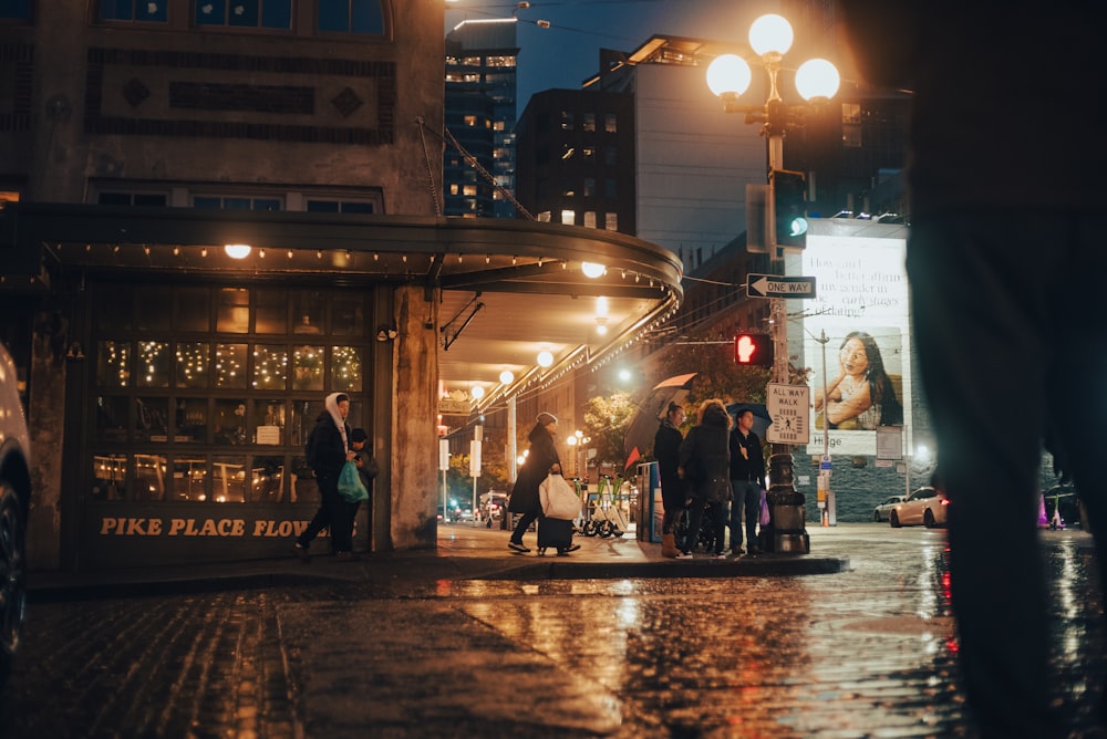 people standing on a sidewalk