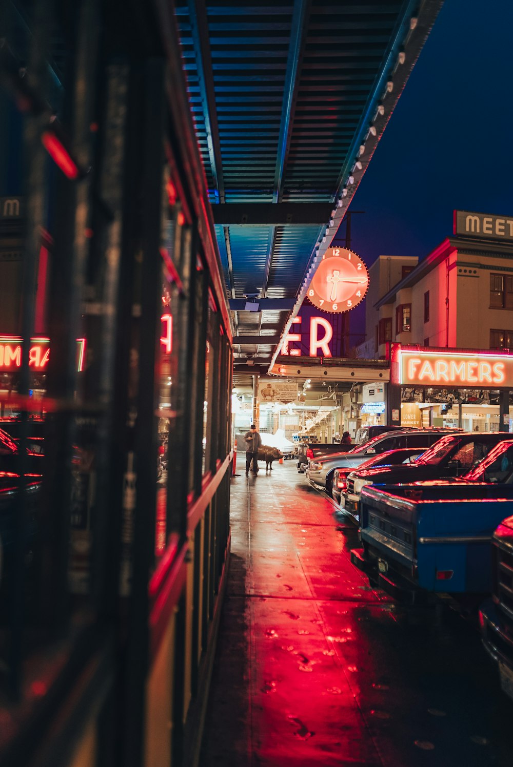 a street with cars and buildings