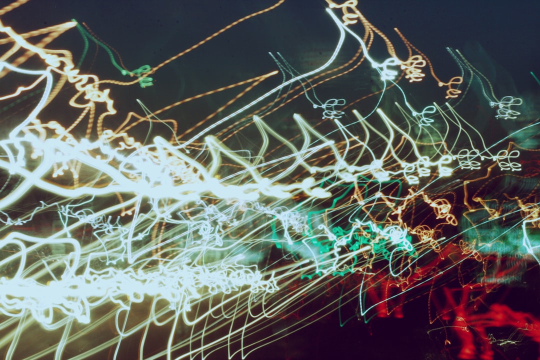 a map of the world, Long exposure of headlights on a street.