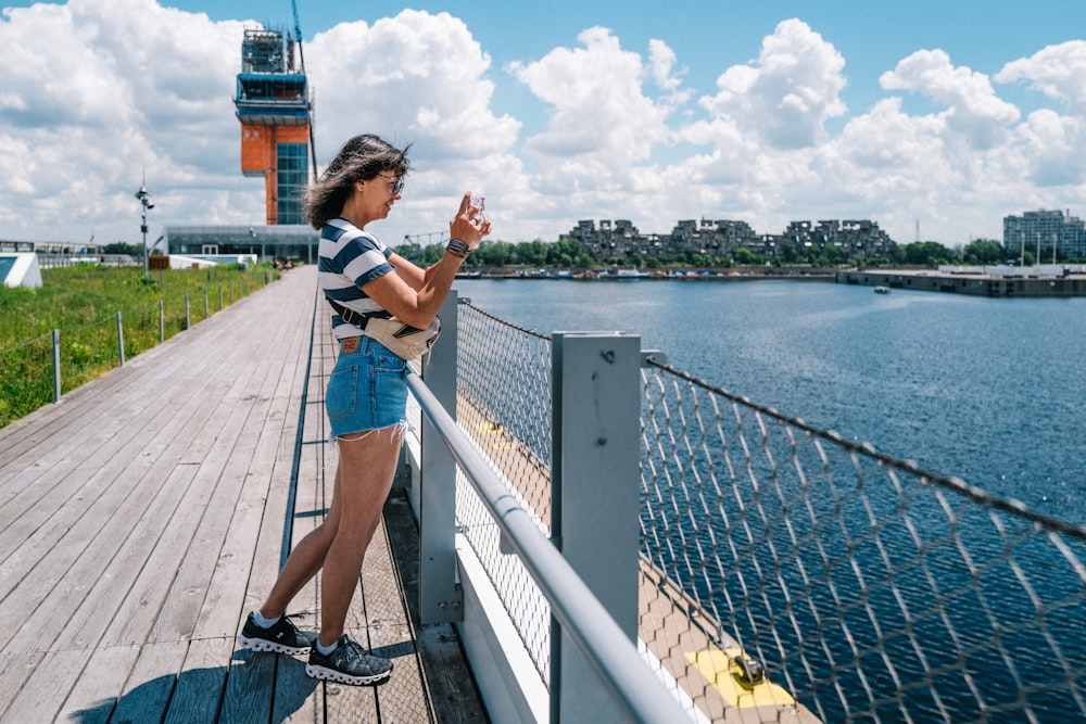 a person standing on a bridge