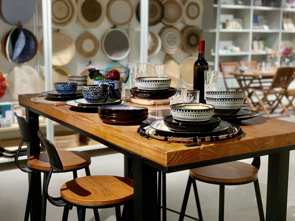 a table with plates and bottles on it