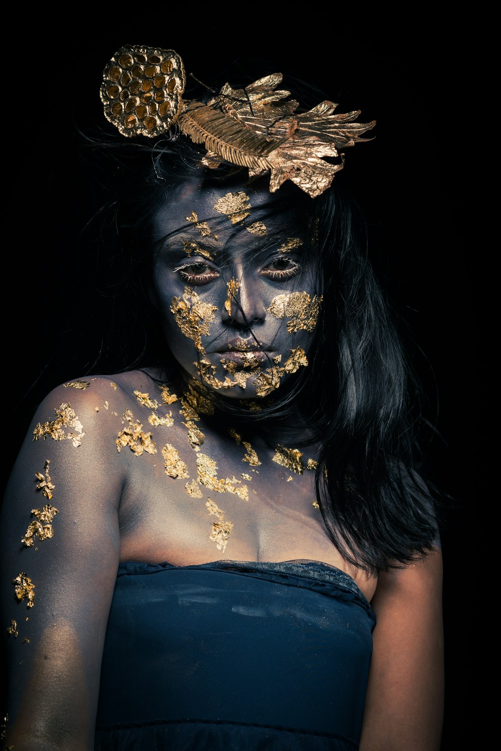 a woman with a mask on her face