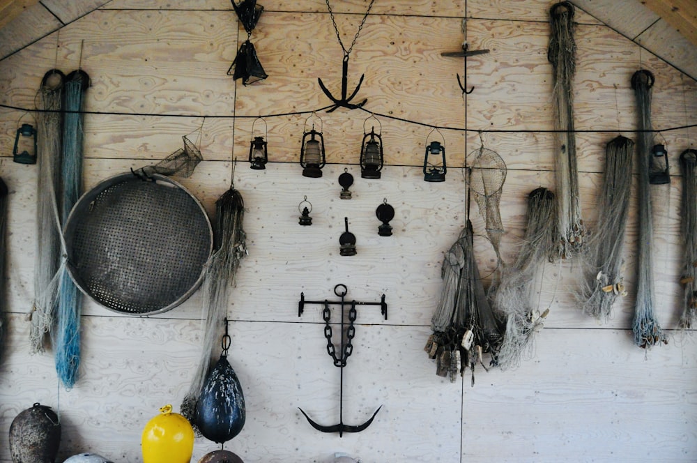 a wall with pots and pans