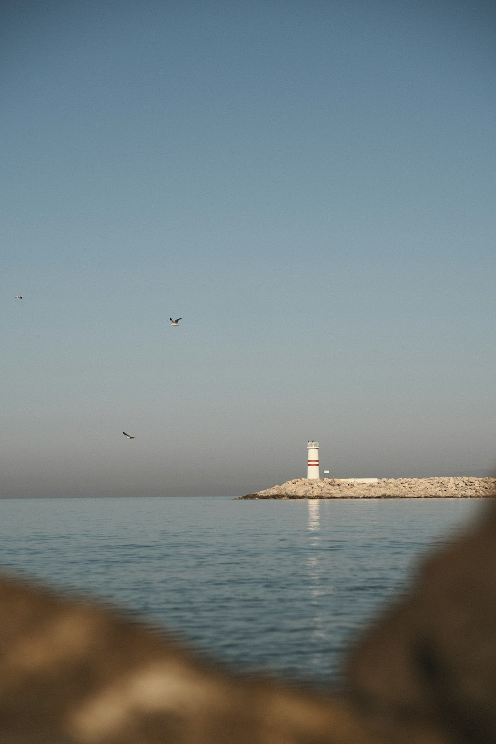 a lighthouse on a pier