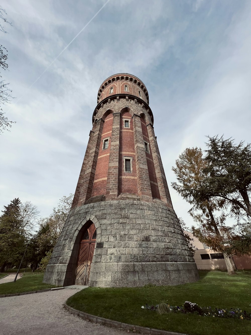 a brick tower with a door