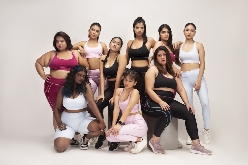 a group of women posing for a photo