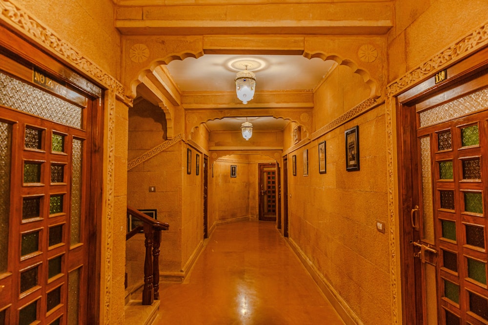 a hallway with wooden doors