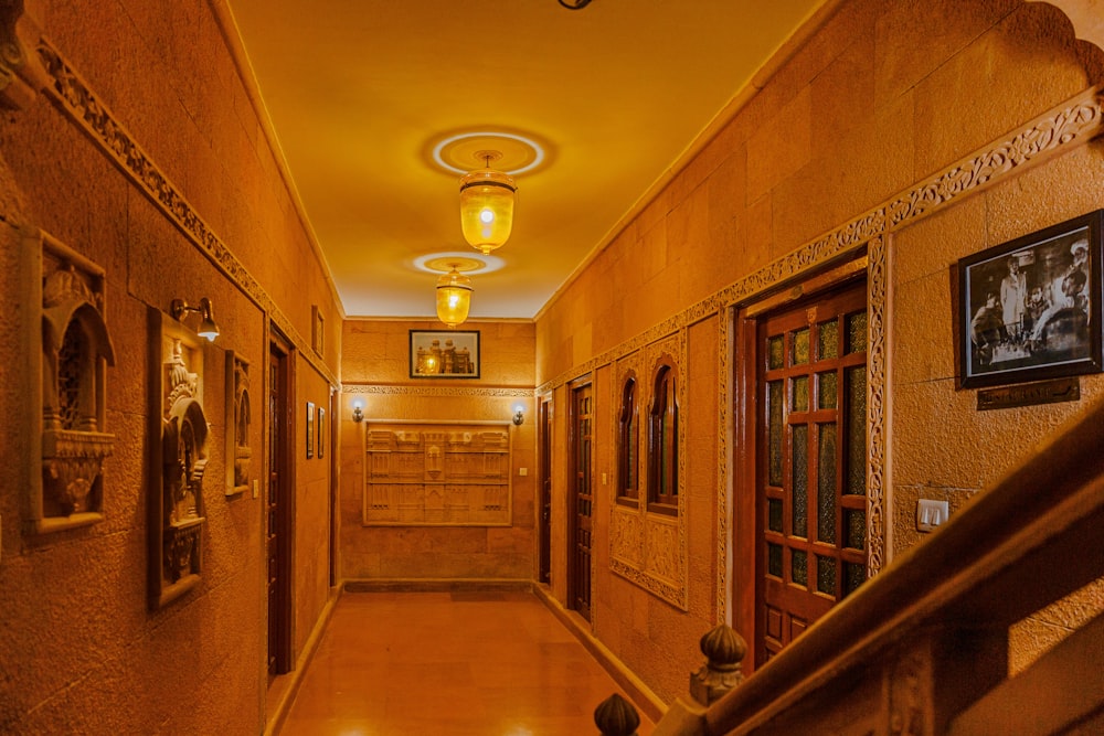 a hallway with paintings on the walls