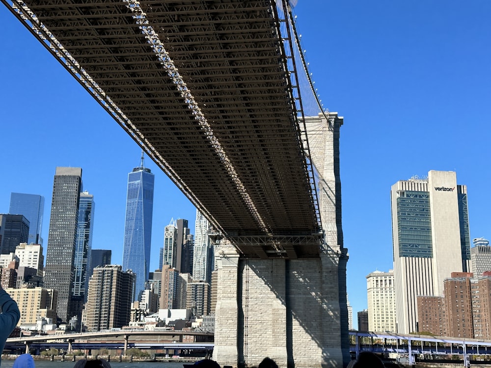 a bridge with a city in the background