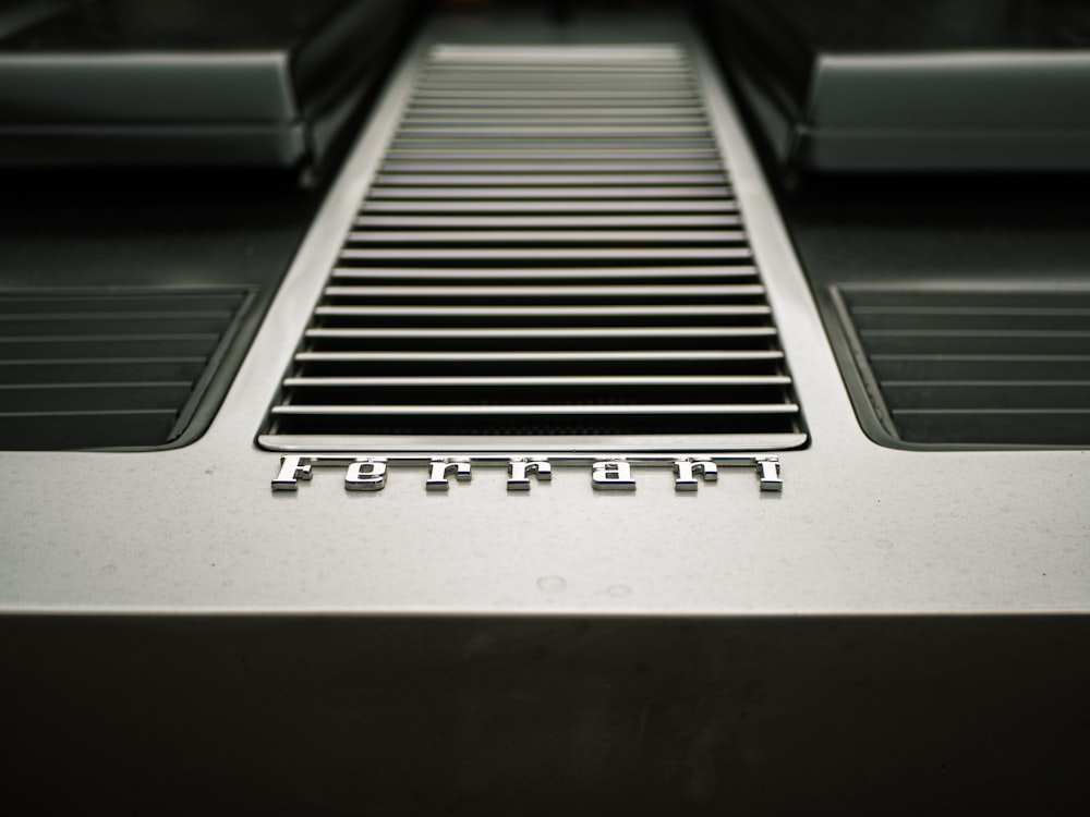 a close up of a car's grill