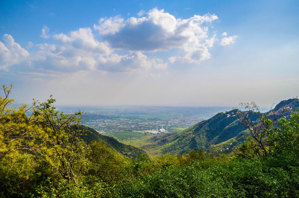 a view of a city from a hill