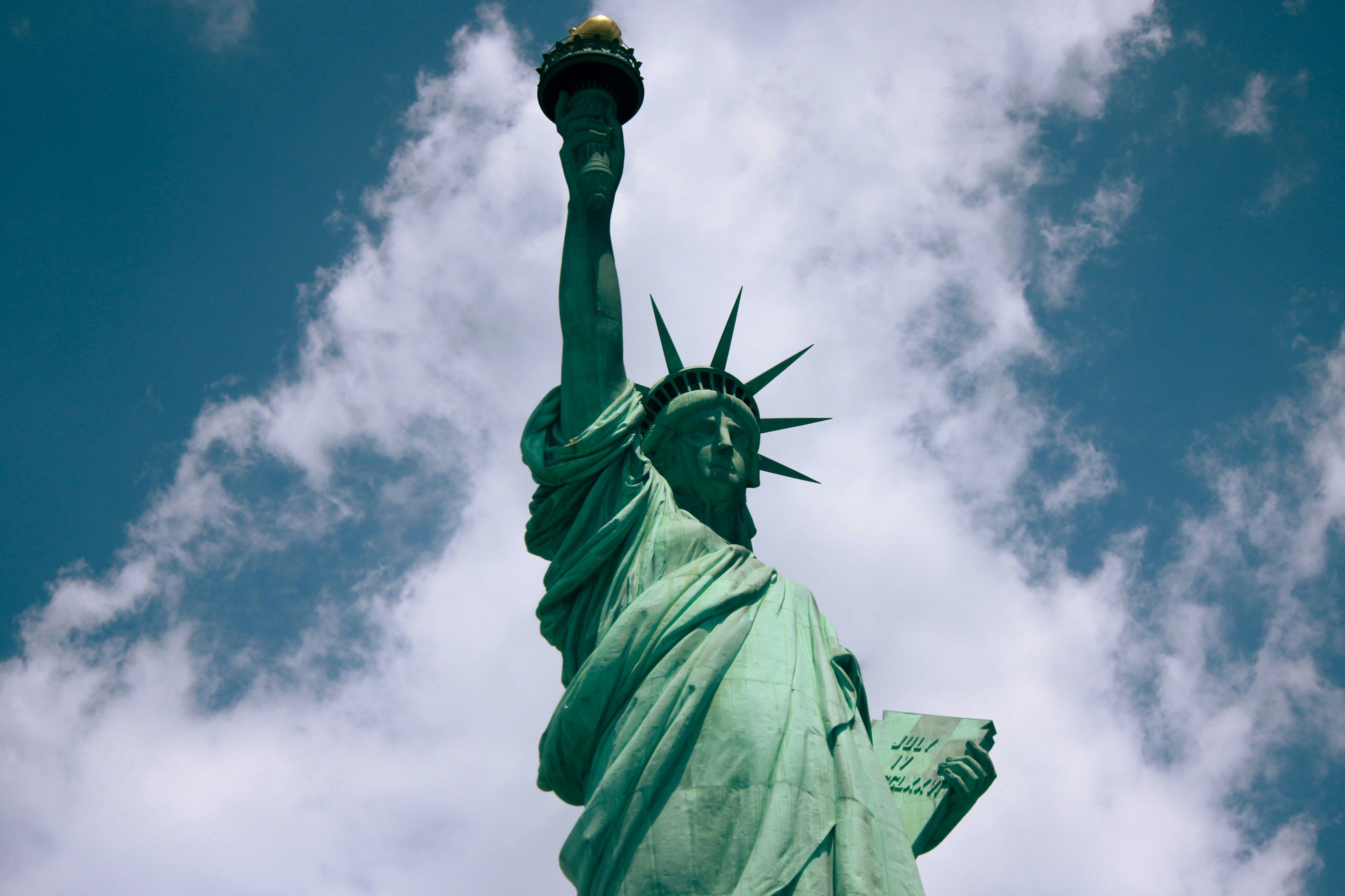 a statue of liberty with Statue of Liberty in the background