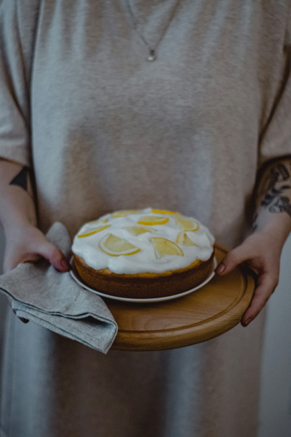 a person holding a cake