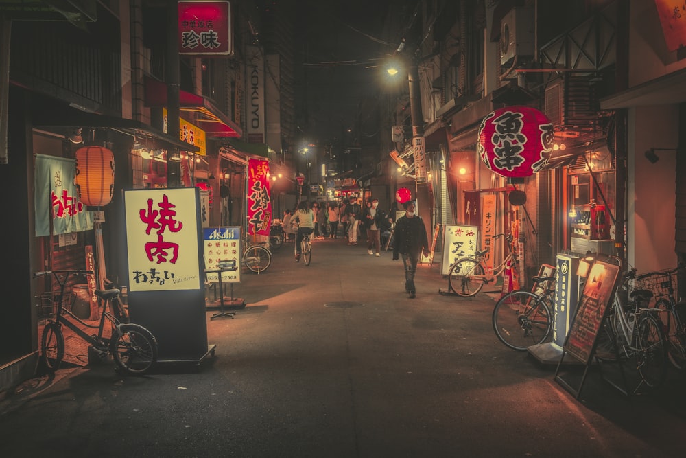 a street with signs and people