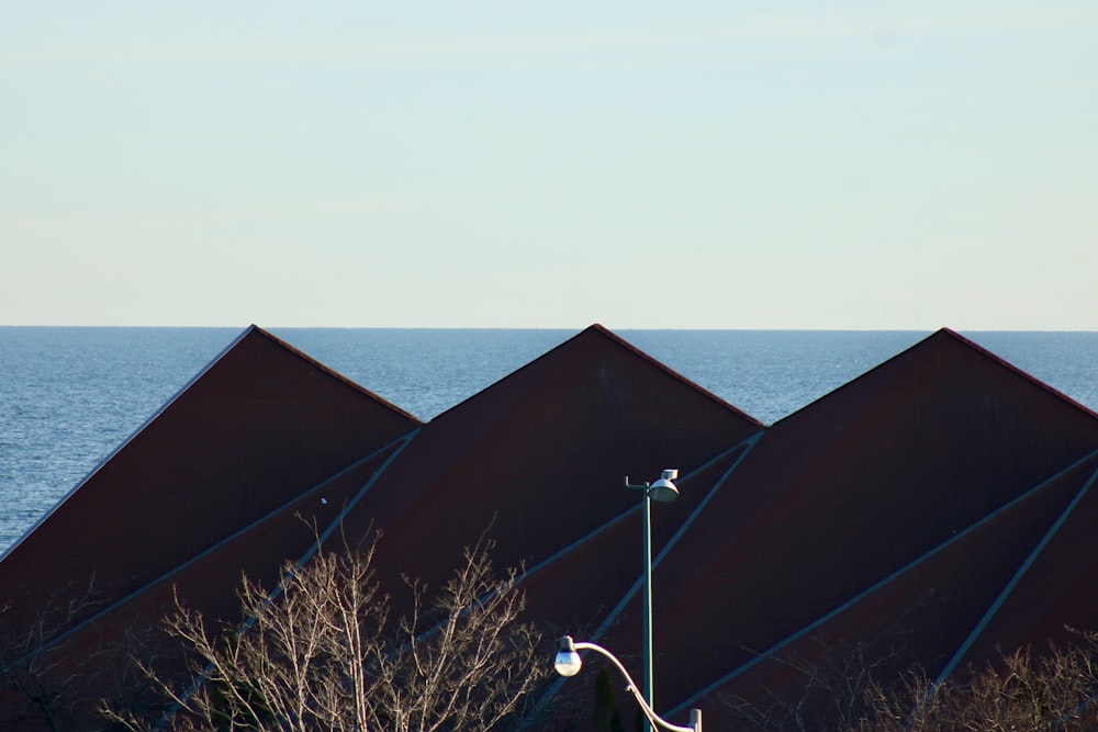 a group of buildings next to a body of water