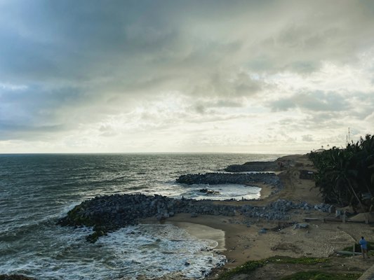 Waves on the rocks below the castle — Cape Coast, Ghana