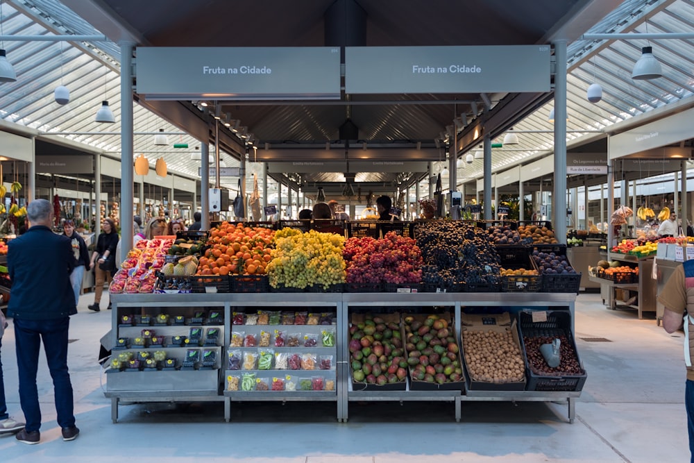 a fruit stand with fruits