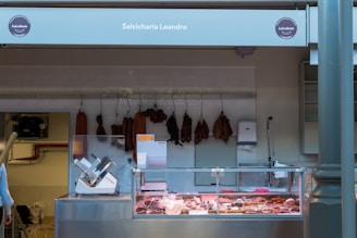 a store with a display of meat