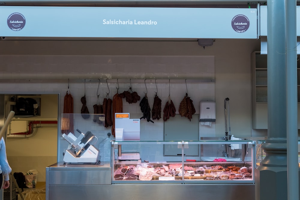 a store with a display of meat