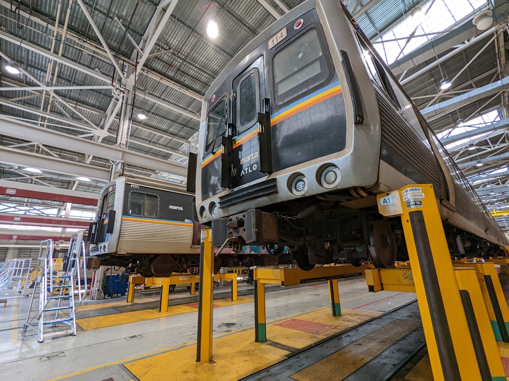 a couple of trains in a station