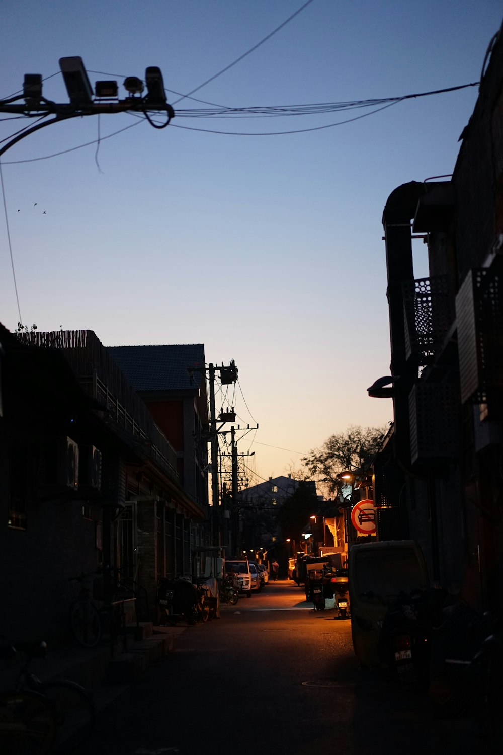 a street with cars and buildings