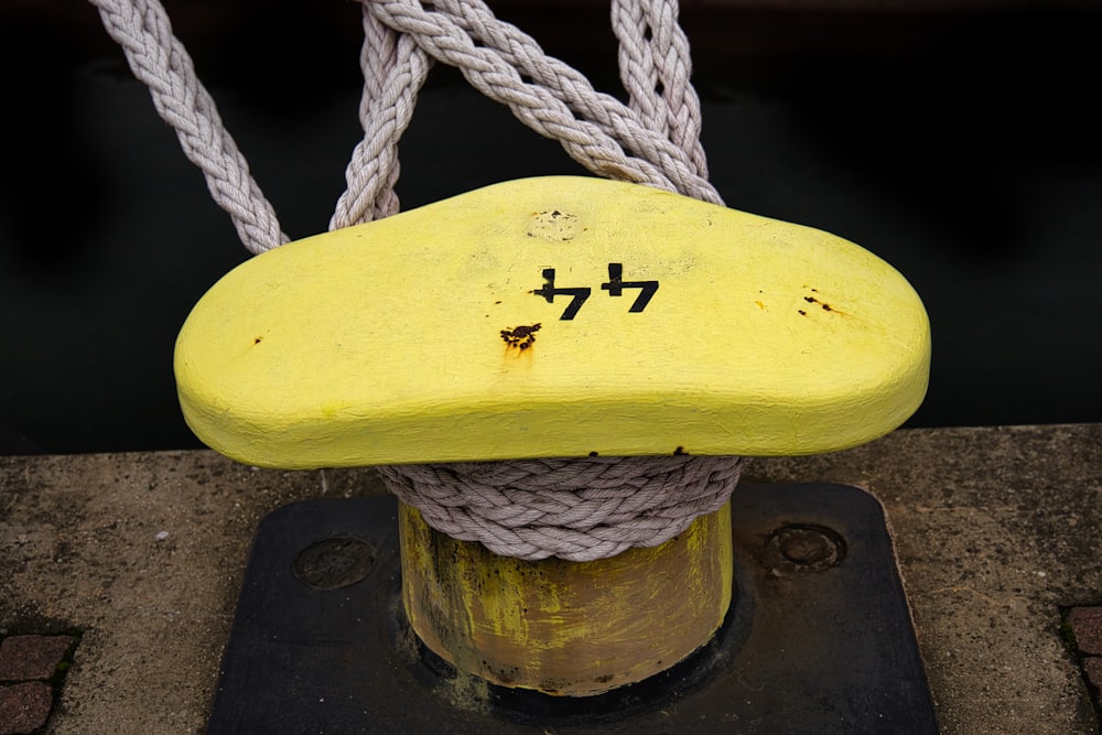 a yellow fruit on a wooden surface