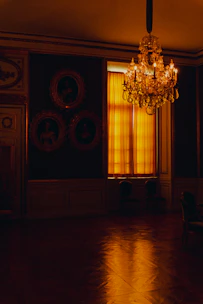 A softly lit, elegant room with a silhouette of a confident man, evoking warmth and trust.