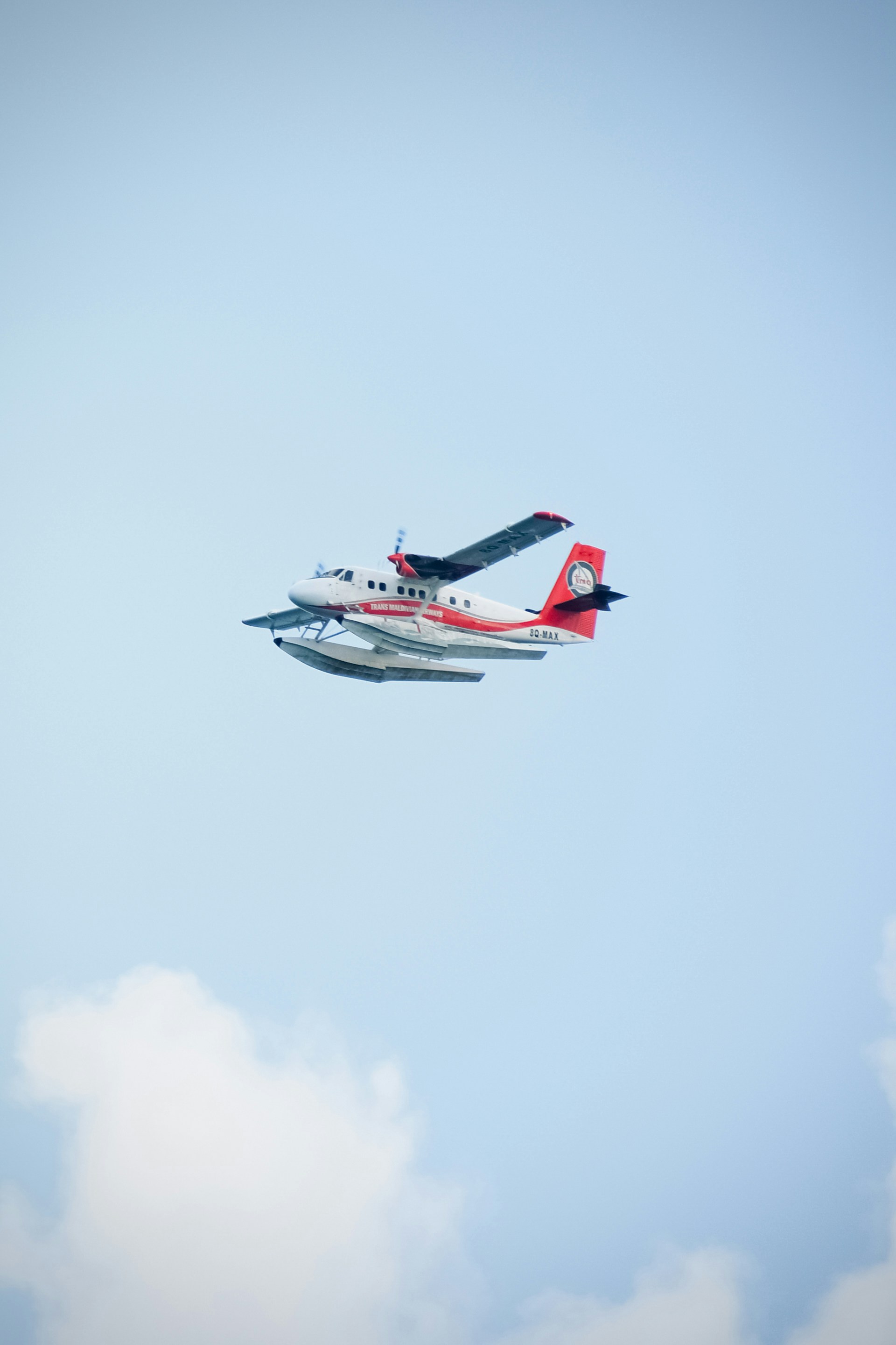 a couple of airplanes flying in the sky