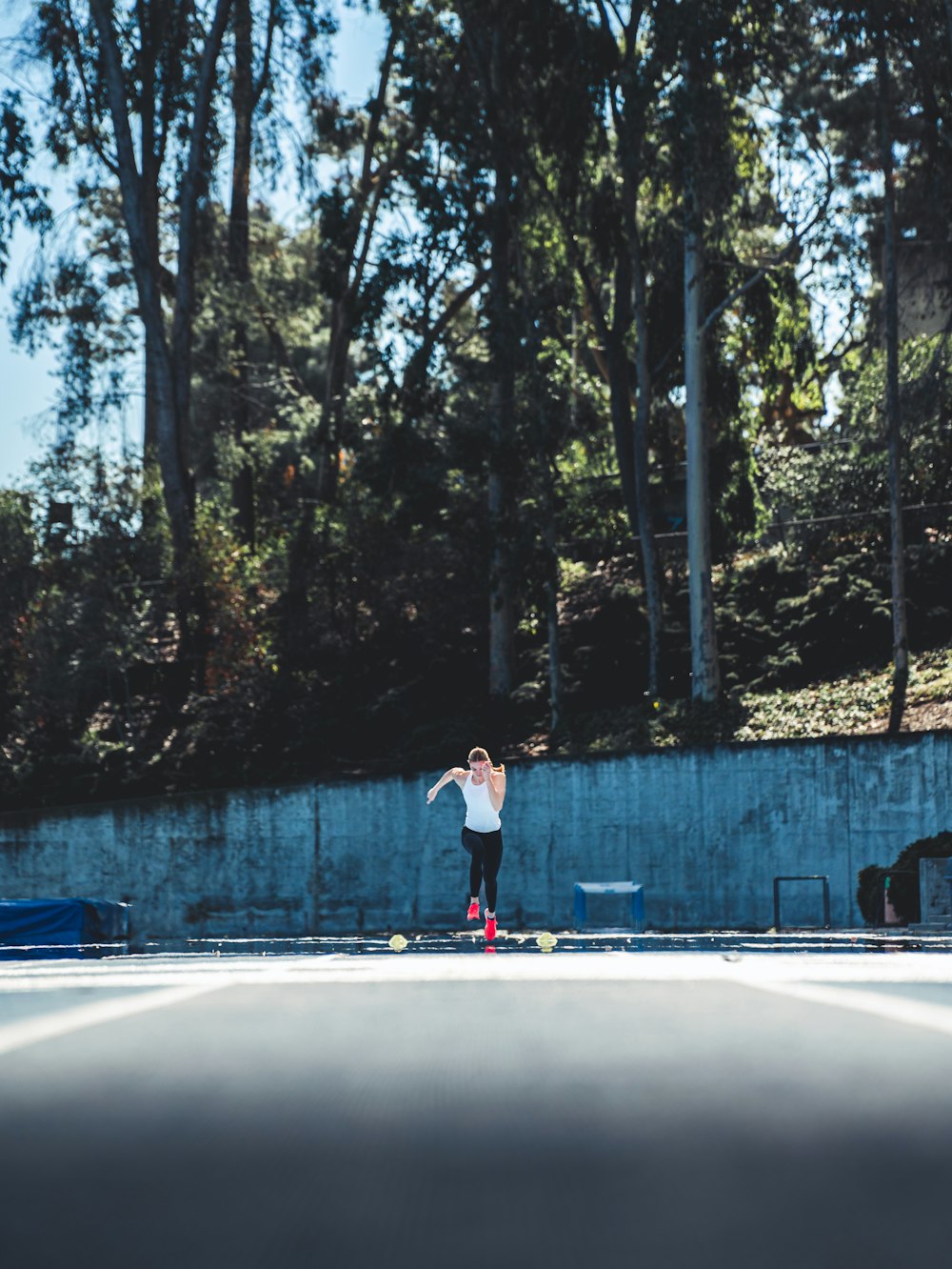 a person jumping on a trampoline