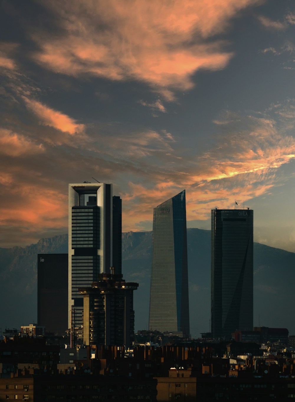 a city skyline at sunset