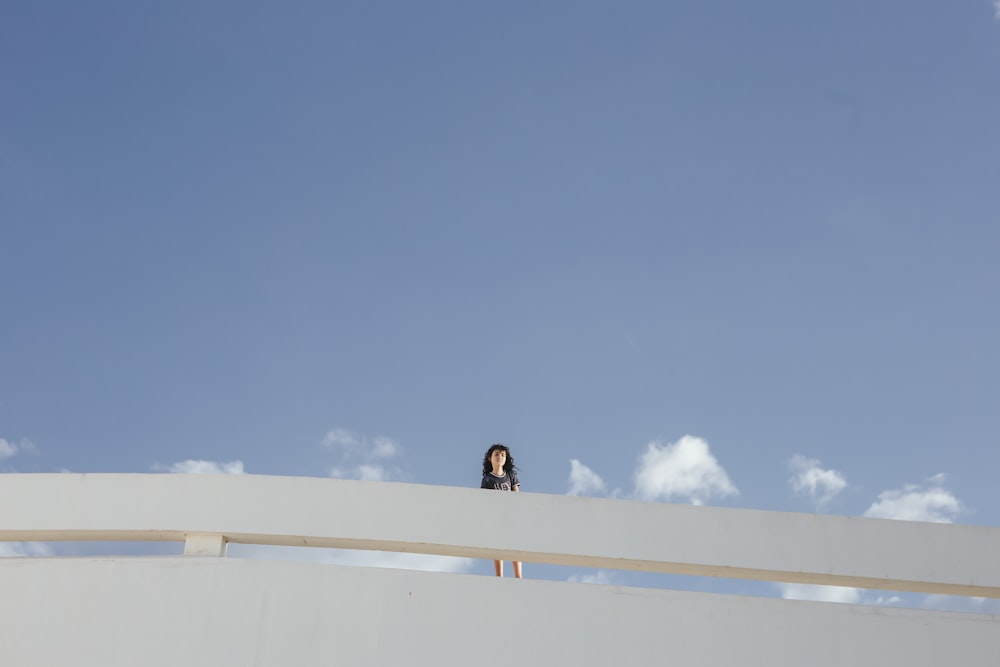 a person standing on a roof