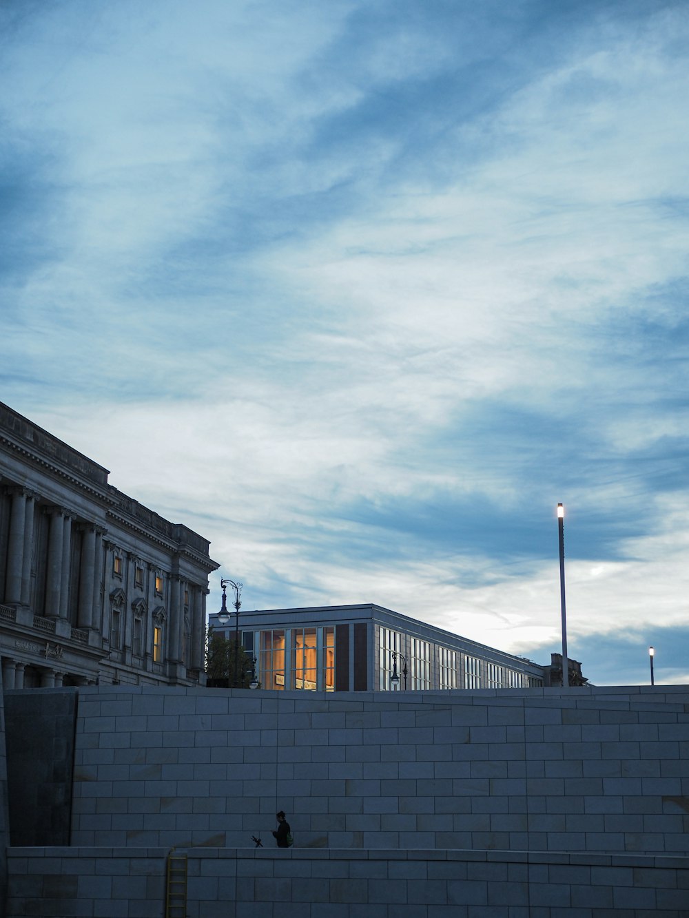 a building with a stone wall