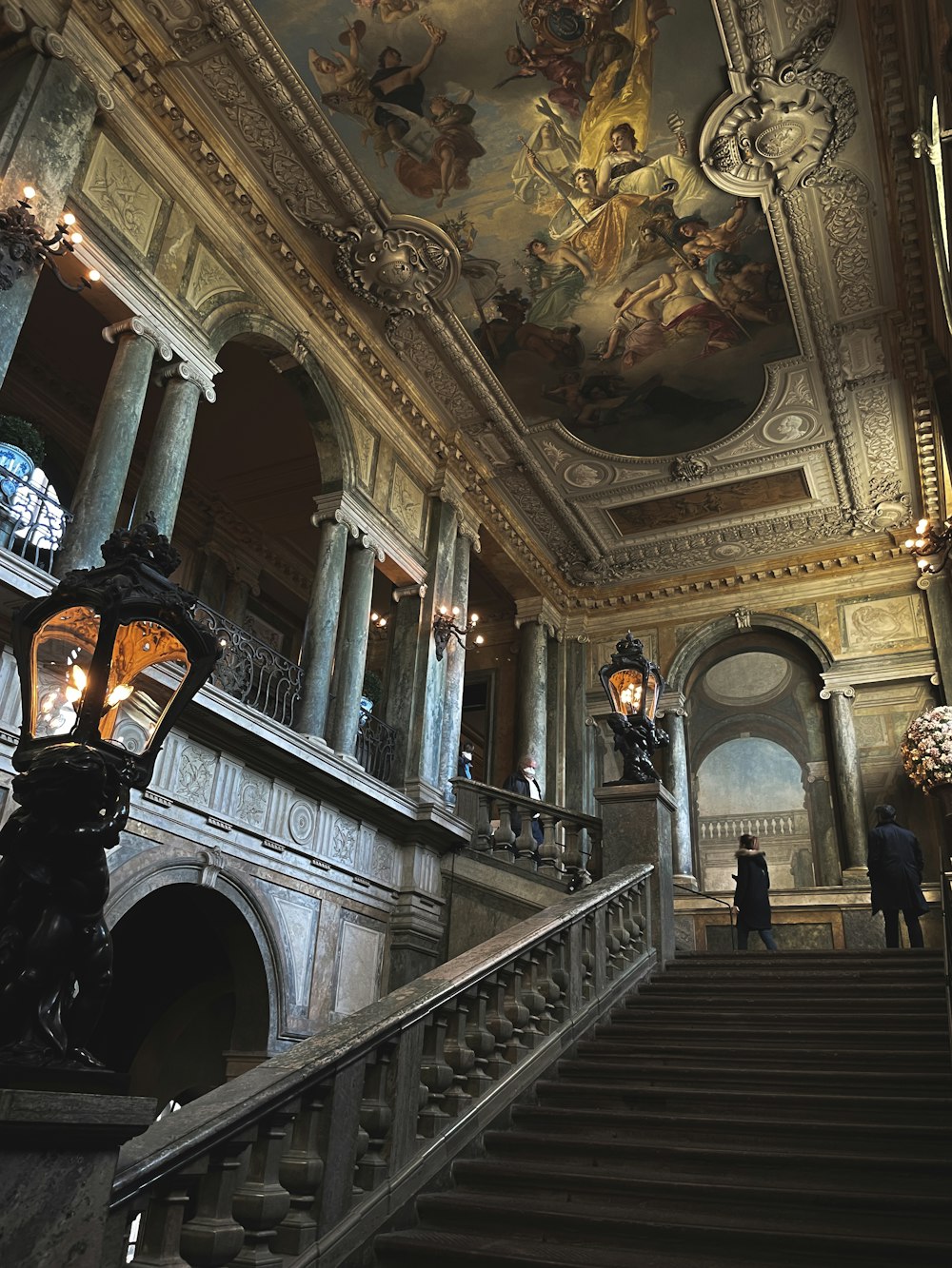 a large ornate building with a staircase