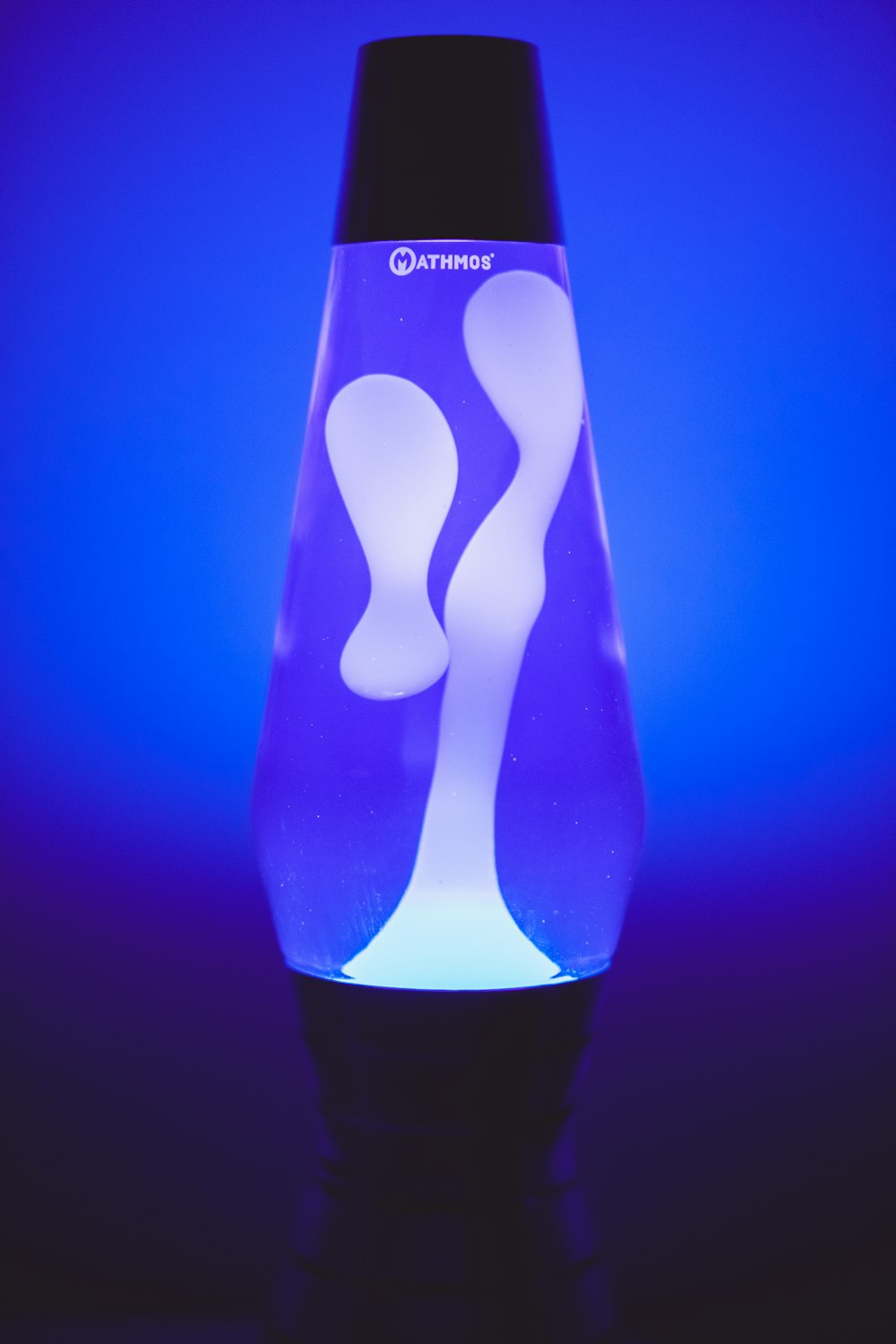 a purple and white bottle