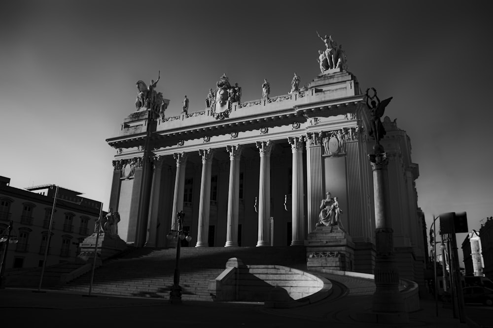 a building with columns and statues